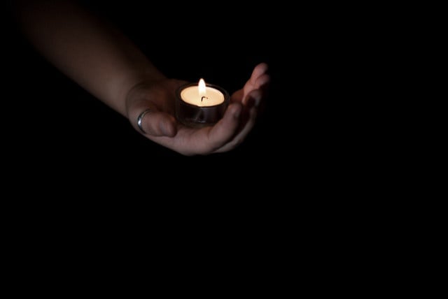 Candle in hand.jpg